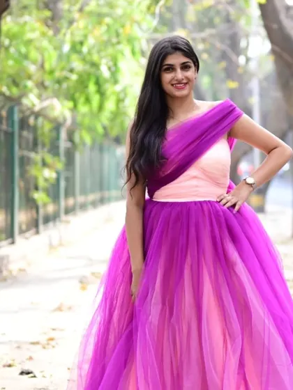 This beautiful double-color gown in shades of pink and purple is a unique and eye-catching rental option.
