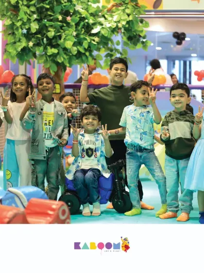 A happy group of friends posing for a picture after a fun day of play. Peace and smiles all around!