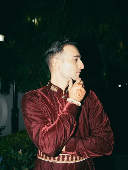 A thoughtful profile shot at night.