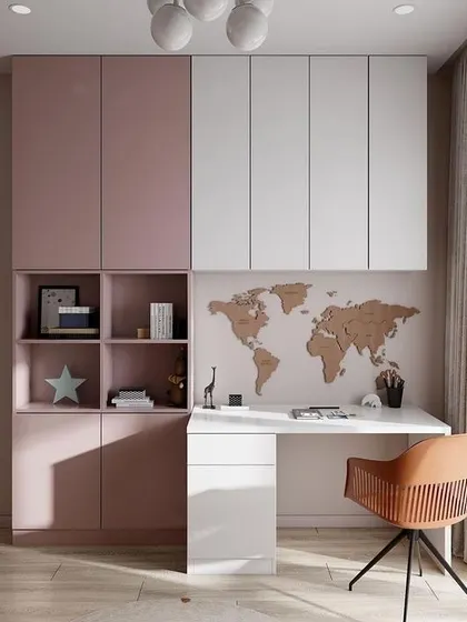 This study unit combines a desk with a large wardrobe and bookshelf. The world map on the wall adds a fun, educational element, making it perfect for a child's room.