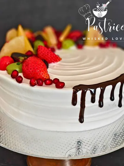 My fresh fruit cake is loaded with seasonal fruits and a light whipped cream, a refreshing and delicious choice for any occasion.
