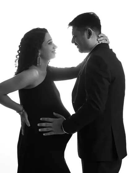 A high-key black and white silhouette of the couple, creating a modern and artistic portrait that focuses on their connection.