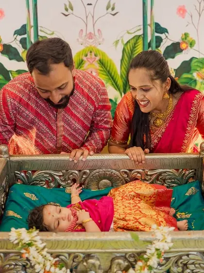 This is the moment I strive to capture. The pure joy and wonder as new parents admire their baby during a traditional naming ceremony, surrounded by love and beautiful details.