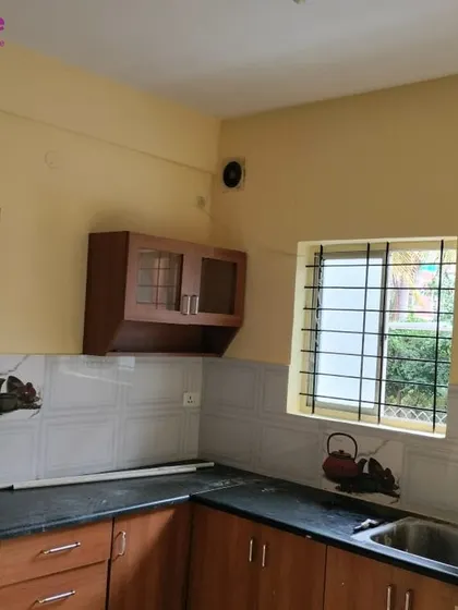 A simple yet effective repaint of a kitchen in a warm, buttery yellow. A fresh coat of paint can instantly brighten up a functional space, making it feel cleaner and more inviting.