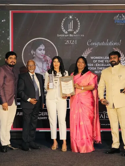 Another photo from the Pride India Awards ceremony, showcasing the formal recognition of my contributions to the wellness industry.