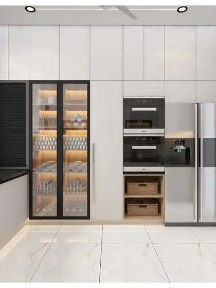 This view shows the integration of a tall unit with a built-in wine cooler, refrigerator, and ovens, demonstrating our ability to design for specialized, luxury appliances.