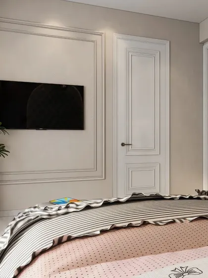 A view of a princess-themed bedroom, showing the elegant wall moulding and clean lines that provide a sophisticated backdrop for the more playful elements.