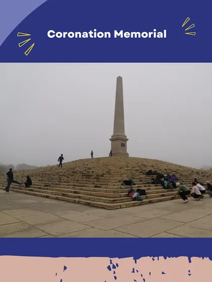 A group sits on the steps of the Coronation Memorial, a sandstone obelisk commemorating the Durbars. We discuss the imperial spectacle and political significance of these events.
