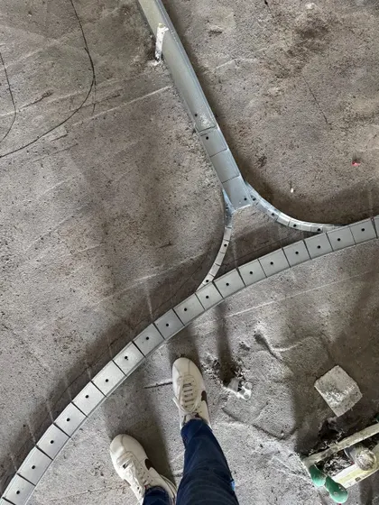 A look at the metal framework for a custom flooring inlay on one of our sites. This level of precision is required to execute complex patterns and details.