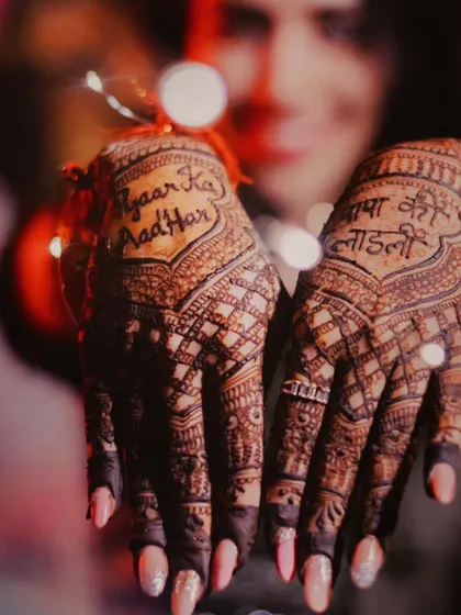 Adding personal phrases is one of my favorite ways to customize a design. This bride chose "Papa ki Laadli" (Father's Darling) and "Pyaar ka Aadhar" (Foundation of Love) to express her feelings.