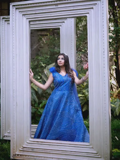 A fairytale moment in a frame. This royal blue sequin gown sparkles beautifully and is perfect for creating magical, artistic photos.