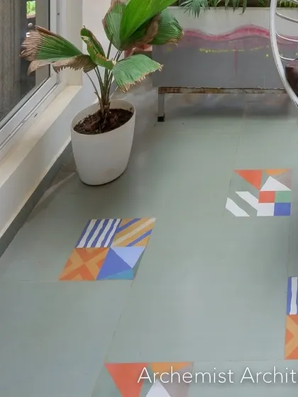 We chose these beautiful patterned floor tiles to add a hint of fun and color to the balcony, complementing the earthy red of the brickwork.