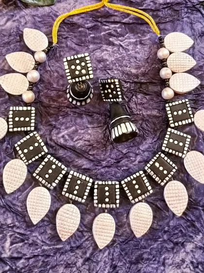 More color variations of the popular square and leaf necklace, including pink, and another view of the black and gold, showing the depth of my inventory.
