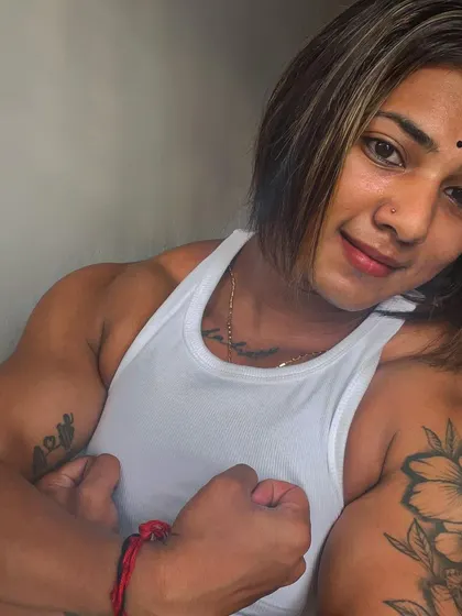 A close-up showing the shoulder and arm definition. Every detail is earned through hard work.