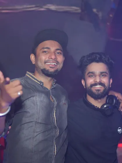 Posing with a friend during my farewell party. The connections and friendships are the best part of this journey.