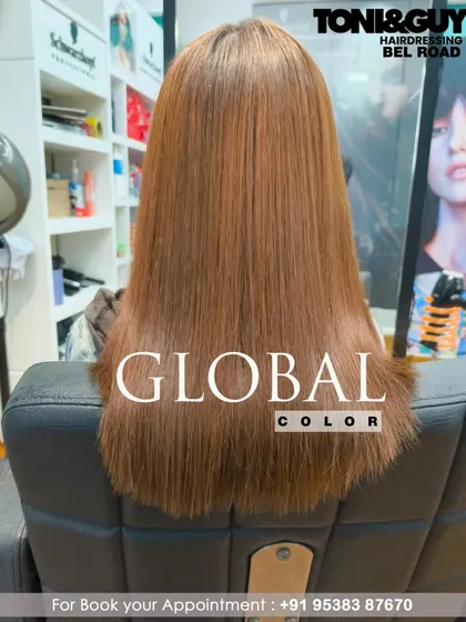 A classic global color service. This client opted for a warm, coppery brown that gives her hair a uniform, healthy, and incredibly shiny finish from roots to ends.