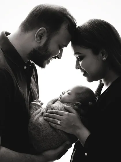 A backlit family portrait in black and white. This technique is challenging but creates stunning, emotional results that are worth the effort.