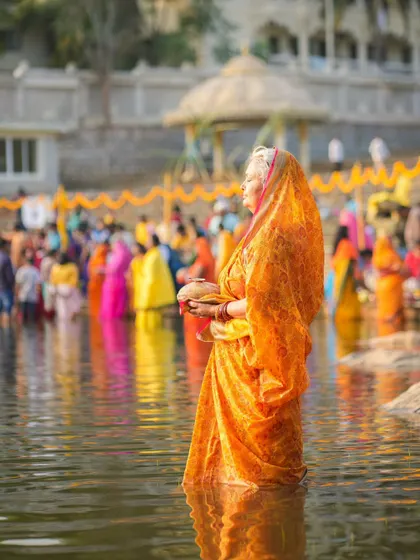 A devotee from our international community participates in Chhath Puja. Our ashram is a place where traditions from all over India are celebrated and shared.
