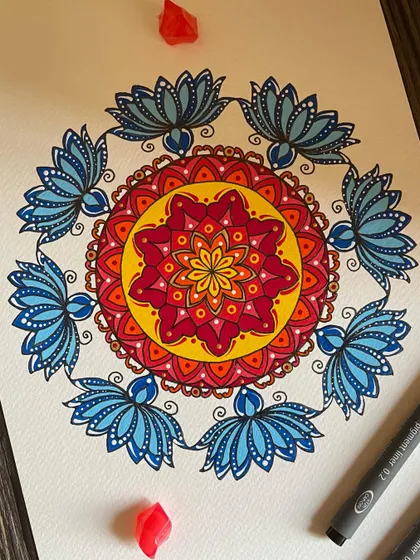 A different angle of the lotus mandala, showing the delicate details in the petals and the joyful color combination.