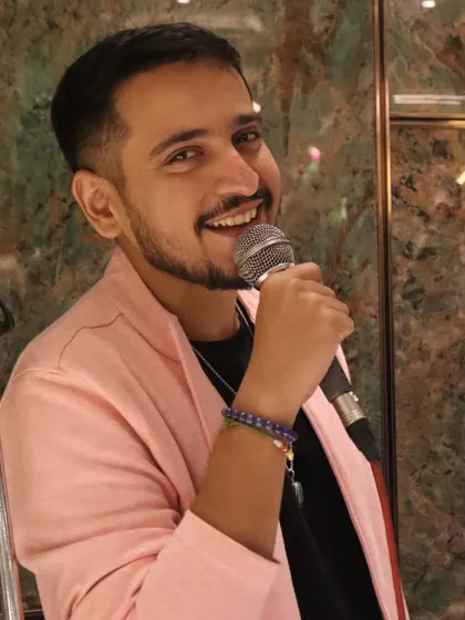 A close-up shot, sharing a smile with the audience. The connection with the people I'm singing for is everything.