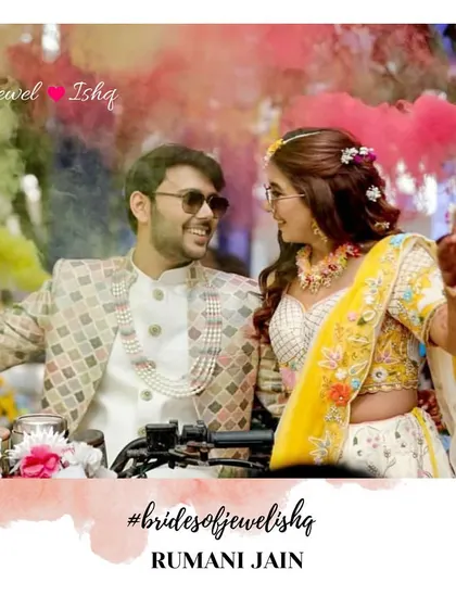 The bride and groom making a grand entrance on a bike with colourful smoke bombs. Her fun floral jewellery is perfect for such a high-energy event.