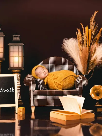 This image captures the rich, warm tones of our classic study theme. The sleeping baby is the centerpiece of a scene that feels both grand and incredibly sweet.