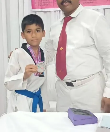 Sairaj Chavan with his silver medal from the Open State Taekwondo Championship. He fought with great determination and skill.