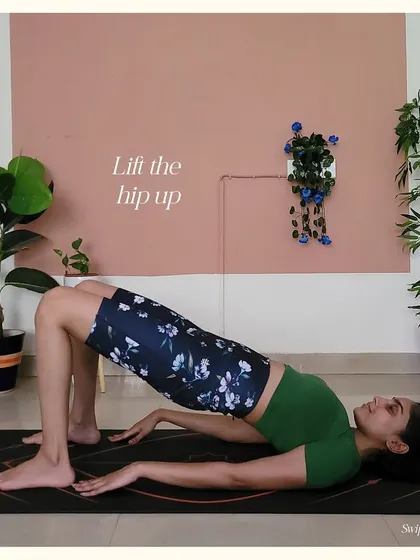 Step 2 for Upward Bow Pose: Lift the hips up into a simple bridge pose to start opening the front of the body.