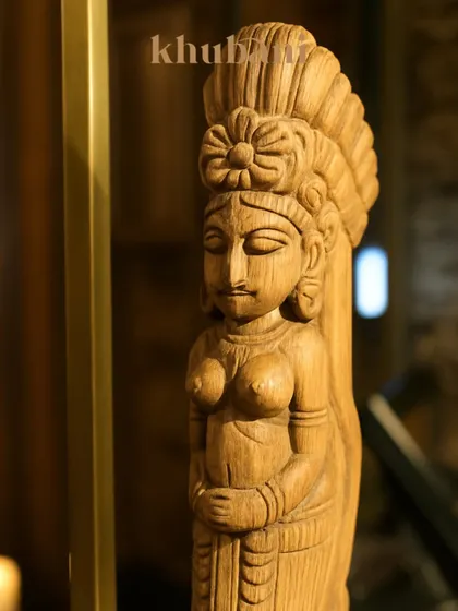 At Khubani, every detail tells a story. This hand-carved wooden statue is just one of the many artistic elements that contribute to our old-world palace feel.