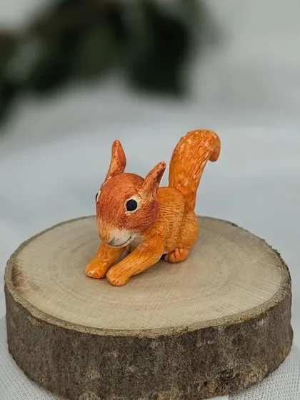 This tiny squirrel is ready to find a new home in a terrarium or on a shelf.