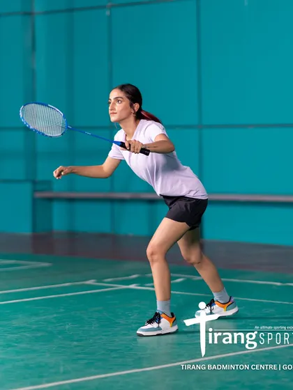 A player in action on our professional-grade synthetic courts. We have invested in the best infrastructure to ensure our players have the perfect surface to train on, reducing the risk of injury.