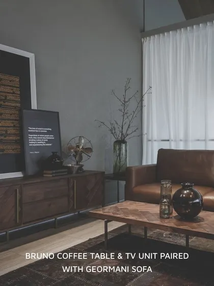 A complete living room setting featuring the Bruno Coffee Table and TV Unit paired with the Geormani Sofa. The warm brown tones of the wood and leather create a cohesive, inviting atmosphere that is both grounded and sophisticated.