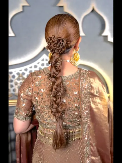 A full back view of the stunningly complex braid, showcasing the skill and creativity involved in its creation.