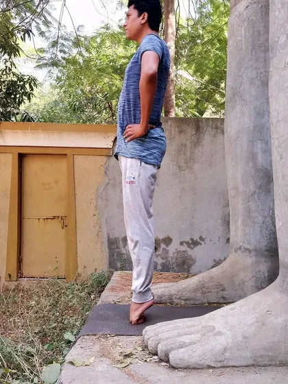 Continuing the toe balance, this variation challenges the ankles and feet, improving stability from the ground up. I guide my students through these foundational practices to ensure a safe and strong yoga journey.