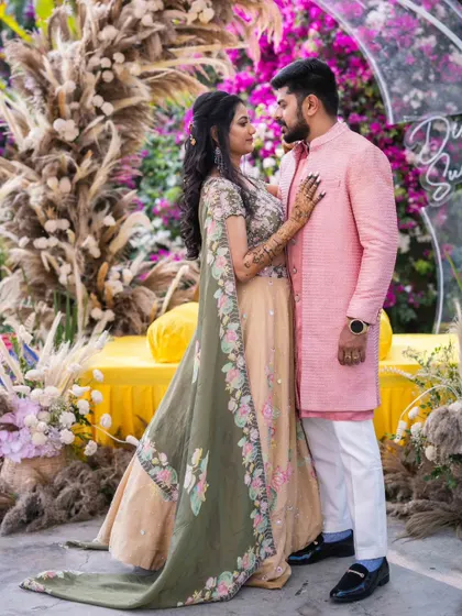 A beautiful collection of photos from Disha and Sumanth's pre-wedding shoot. Her makeup is soft and romantic, perfect for these candid and posed shots in a lovely garden setting.
