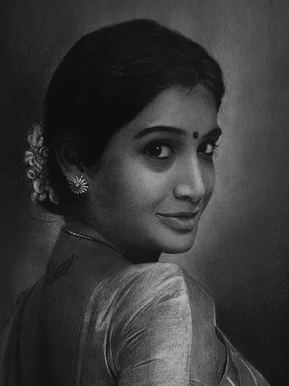 An A3 commissioned portrait that captures the classic beauty of Indian elegance, with a focus on the subject's expressive glance over her shoulder.