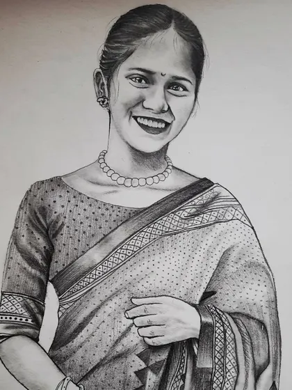 This A3 size portrait of a smiling woman in a saree was a commission work. I used graphite pencils to carefully render the fabric's texture and the joyful look on her face.