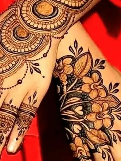 A beautiful fusion design combining a floral vine on one hand with a circular mandala pattern on the other. This asymmetrical look is modern, stylish, and perfect for any celebration.