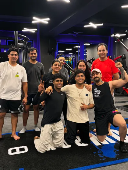Happy faces all around the studio. This is what our community looks like: supportive, motivated, and having fun.
