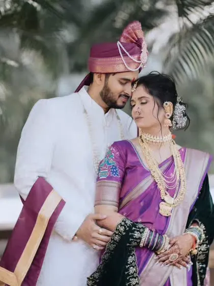 An intimate couple portrait surrounded by nature. The bride's makeup looks soft and natural in the daylight.