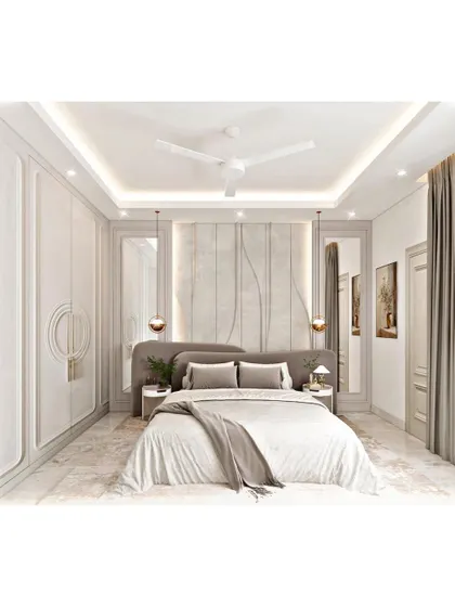A serene and minimalist bedroom in shades of grey and white. The design features a textured headboard wall, modern pendant lights, and sleek, handleless wardrobes for a clean and uncluttered look.