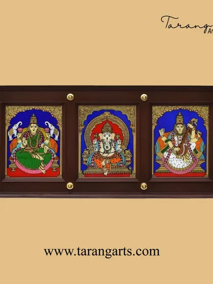 This 3-in-1 glass painting panel features the powerful trio of Lakshmi, Ganesha, and Saraswati. It's a perfect piece for inviting wealth, wisdom, and success into your home or workplace.