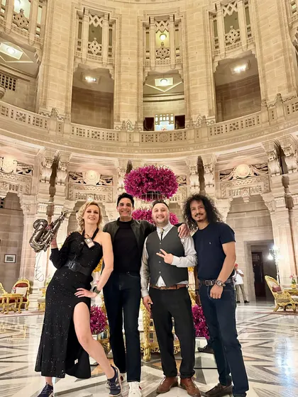 Posing with my talented artist friends at the magnificent Umaid Bhawan Palace in Jodhpur. Collaborating with musicians like saxophonist Tanique Fossa and percussionist Binny Dhadwal is key to creating unforgettable nights.