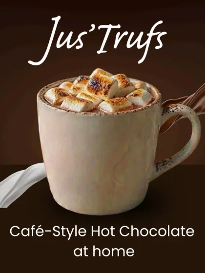 Our café-style hot chocolate at home illustration shows a white mug with toasted-looking toppings above the chocolate drink.