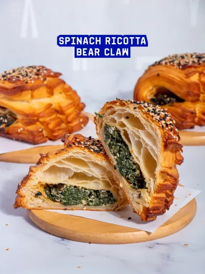 The Spinach Ricotta Bear Claw is a classic savoury pastry. The creamy spinach and ricotta filling is encased in a beautifully shaped, flaky croissant dough.