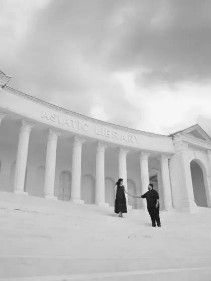 A black and white recreation of the Asiatic Library set at 'Sets in the City'. This dramatic, wide-angle shot creates a sense of grandeur for this anniversary shoot.