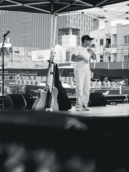 A wider view of the stage during our daytime soundcheck. You can see the empty venue, a calm before the storm of the live show.