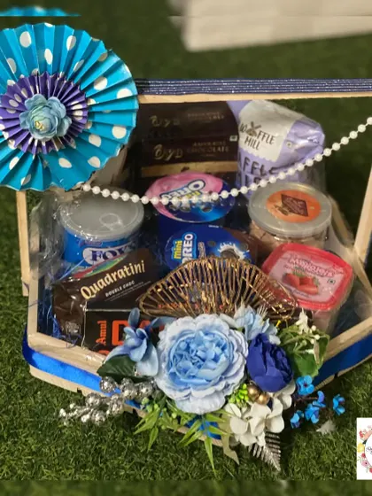A snacks hamper designed as part of a wedding trousseau. These are great for placing in the rooms of out-of-town guests as a welcome gift.