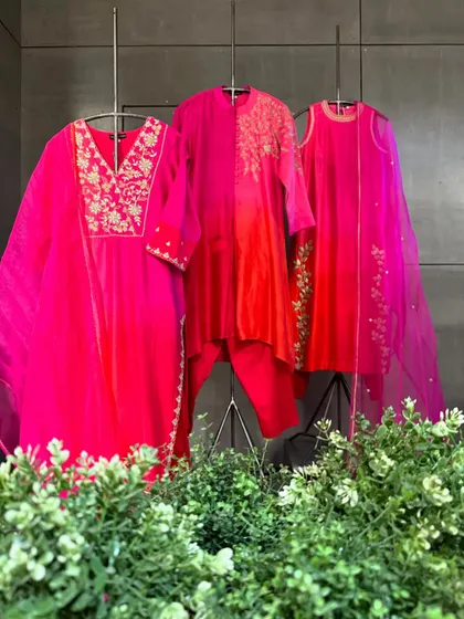 A beautiful display of ombre and embroidered suits. The gradient colors and delicate handwork create a soft, romantic look for your festive events.