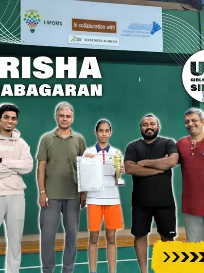 Prisha Prabagaran with her coaches and trophy after securing the Silver medal in U12 Girls Singles, a result of our collaboration with Prakash Padukone Badminton Academy.